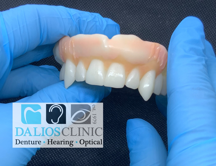 What are the eligibility criteria for implant dentures?