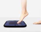 What are the functions of a body fat scale?