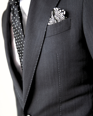 The Complete Guide to Tailored Suits: Fit, Fabric, and Elegance
