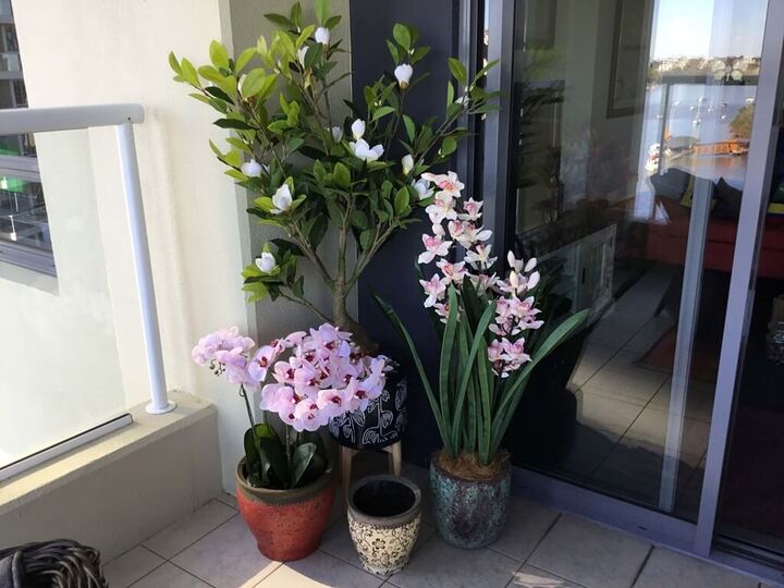 Beautiful Blooms: Artificial Flowers Adorning a Vase